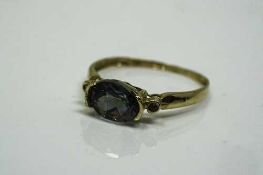 A 10ct gold mystic topaz ring, 8 mm x 6 mm stone, size M/N.