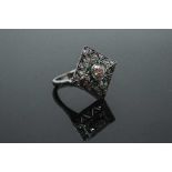 A white gold Art Deco style emerald and diamond ring,