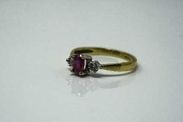 An 18ct yellow gold ruby and diamond ring, 2.5g, size M/N.