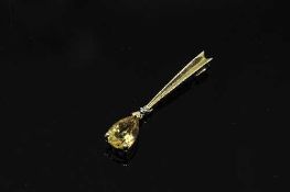 A 14ct yellow gold citrine and diamond pendant, gold drop length 31 mm.