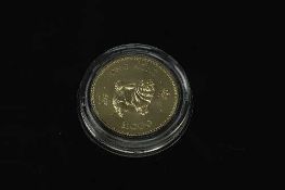 The Royal Mint - A Hong Kong $1000 coin, Lunar Year of the dog 1982, 22ct gold 15.98g.