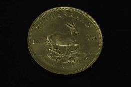 A South Africa gold 1 oz Krugerrand 1975.