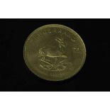 A South Africa gold 1 oz Krugerrand 1975.