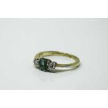 An antique 18ct yellow gold emerald and diamond ring, size J.