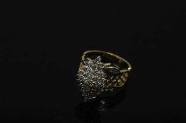 A 10ct gold diamond cluster ring, approximately 1.25ct, size O.