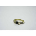 A 14ct yellow gold diamond and sapphire ring, 5g, size M.