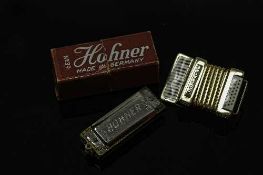 A miniature Hohner mouth organ model no. 39, length 3.