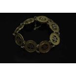 A 14ct gold Chinese panel bracelet, 14.8g.