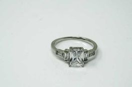 A Sterling silver Art deco style emerald cut ring, size N.