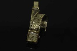 A 9ct gold Rolex Lady's wrist watch, model number 4795,