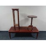 A rectangular mahogany coffee table together with an Edwardian two tier plant stand and a wine