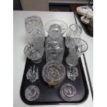 A tray of glass ware, crystal decanter, vases,