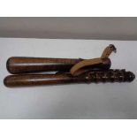 Two wooden truncheons