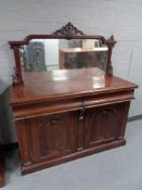 A Victorian mahogany mirror backed sideboard. Height 88 cm, width 137 cm and depth 48 cm.