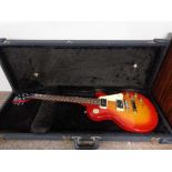 An Epiphone Les Paul electric guitar in hard shell case