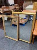 Two gilt framed bevelled mirrors