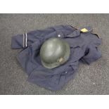 A WWII helmet with later decal and a German Air Force tunic