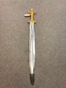 A gilt handled ornamental short sword