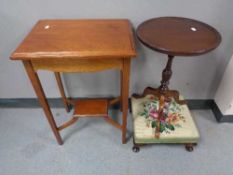 A mahogany wine table together with a tapestry footstool and Edwardian table