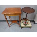 A mahogany wine table together with a tapestry footstool and Edwardian table