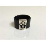 A Sterling silver and leather designer ring