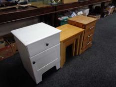 A painted bedside cabinet and three drawer pine stand, nest of tables.