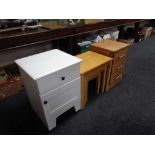 A painted bedside cabinet and three drawer pine stand, nest of tables.