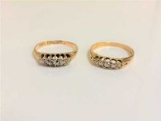 Two 18ct gold five stone diamond rings