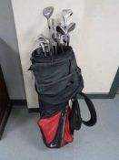 A Calloway golf bag containing irons and drivers