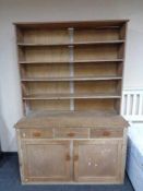 An antique pine kitchen dresser