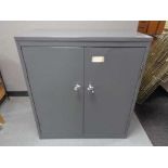 A mid century metal double door office cabinet, width 92 cm.