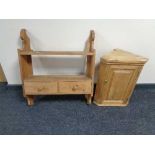 A pine wall shelf fitted with two drawers together with a small pine cabinet