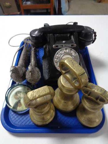 A tray of GPO black Bakelite telephone, three brass weights,