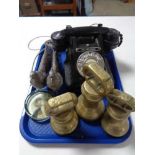 A tray of GPO black Bakelite telephone, three brass weights,