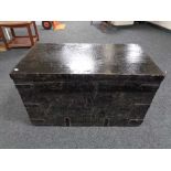 An antique pine metal bound trunk