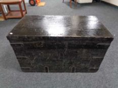 An antique pine metal bound trunk