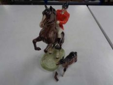 A Beswick figure - Huntmsan on rearing horse, number 868 (Af),