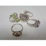 Five silver dress rings CONDITION REPORT: 3 size P, 1 size Q and 1 size S.
