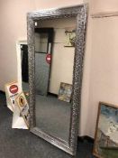 A silvered framed 5' x 2' mirror