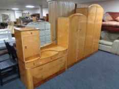 A four piece Birds Eye maple bedroom suite comprising of Lady's and Gent's wardrobe,