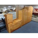 A four piece Birds Eye maple bedroom suite comprising of Lady's and Gent's wardrobe,