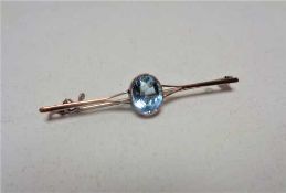 A yellow gold aquamarine brooch