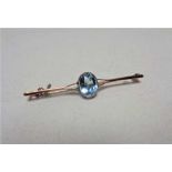 A yellow gold aquamarine brooch