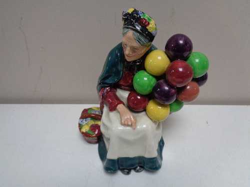 A Royal Doulton figure - The Old Balloon Seller HN 1315