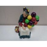 A Royal Doulton figure - The Old Balloon Seller HN 1315