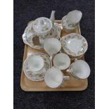 A tray of twenty three pieces of Duchess Greensleeves tea china