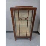 A mid century display cabinet