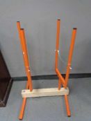 A metal log cutting stand