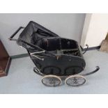 A Victorian pram (a/f)