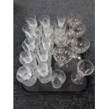A tray of drinking glasses,